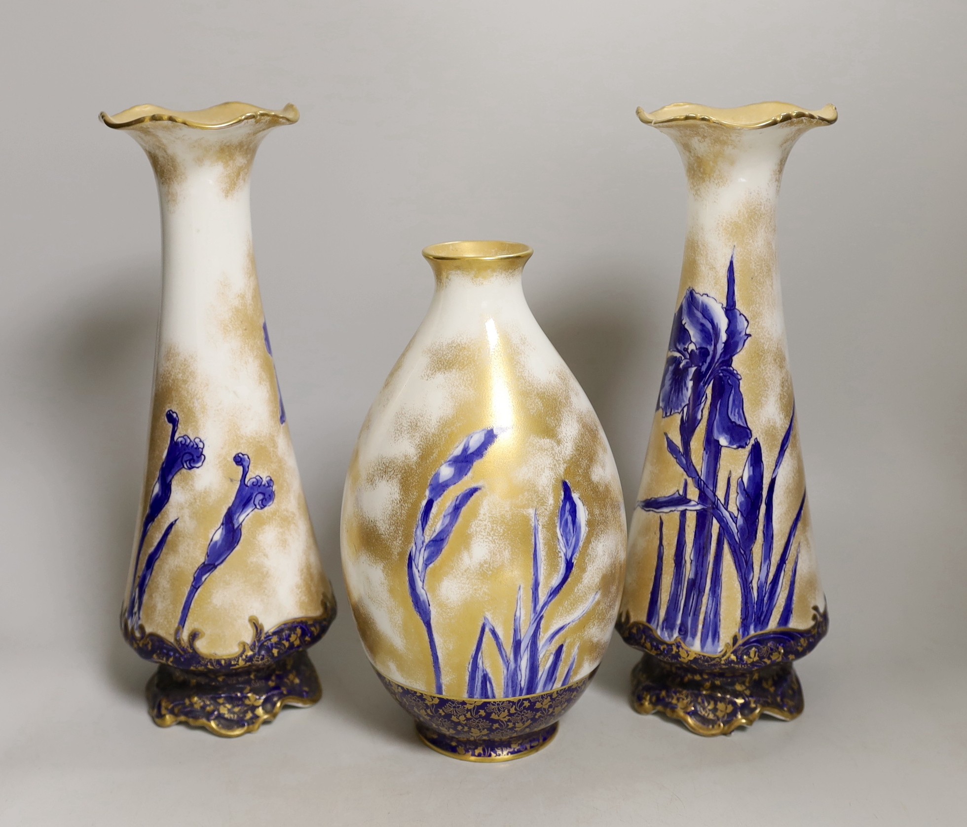 A pair of Royal Doulton vases and another (3), pair 29cms high